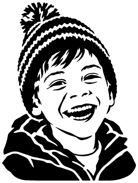 a laughing boy pumpkin stencil made from the photo
